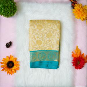 Silk gold and green saree with aari designer blouse
