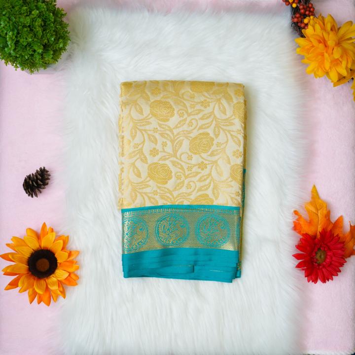 Silk gold and green saree with aari designer blouse