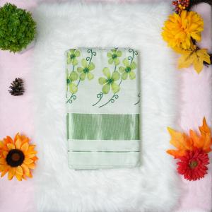 Traditional kerala handloom green tissue saree - floral embroidery