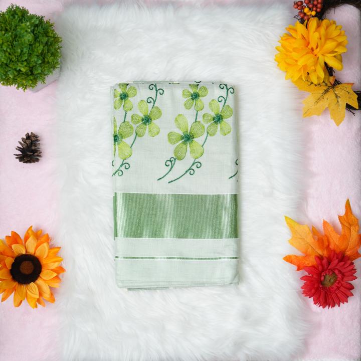 Traditional kerala handloom green tissue saree - floral embroidery